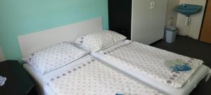 Postel nebo postele na pokoji v ubytování Ubytování Janami Rakvice