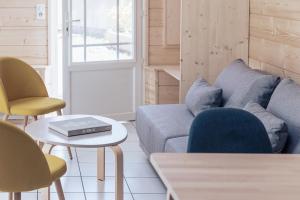 Posezení v ubytování Le Clos du 5 - Appart Hotel Bagneres