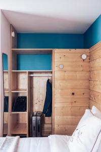 Postel nebo postele na pokoji v ubytování Le Clos du 5 - Appart Hotel Bagneres