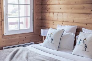Postel nebo postele na pokoji v ubytování Le Clos du 5 - Appart Hotel Bagneres