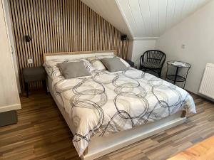 Voodi või voodid majutusasutuse Apartmány v ráji (Českém) toas