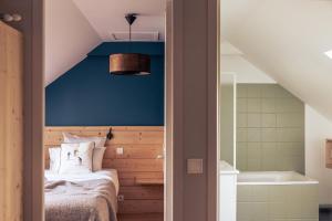 Postel nebo postele na pokoji v ubytování Le Clos du 5 - Appart Hotel Bagneres