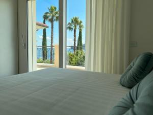 Letto o letti in una camera di Villa Silvia Apartments