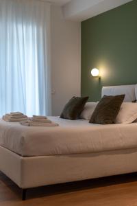 Letto o letti in una camera di Villa Silvia Apartments