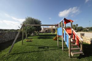 a playground with a slide and a ladder at Casal Sikelio in Cassibile