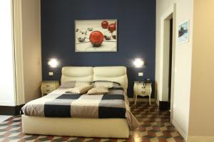 Letto o letti in una camera di B&B Suite Cutelli
