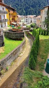 an aerial view of a city with trees and buildings at Sveta apartment Auronzo in Auronzo di Cadore