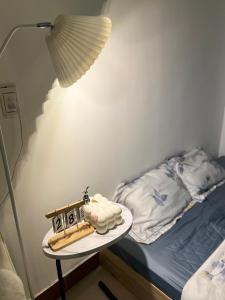 Postel nebo postele na pokoji v ubytování Blue Homestay Hải Phòng