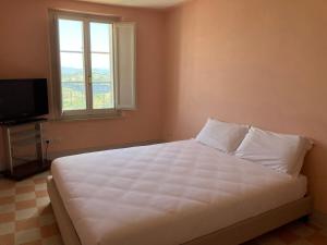 Ένα ή περισσότερα κρεβάτια σε δωμάτιο στο Residenza Perusia