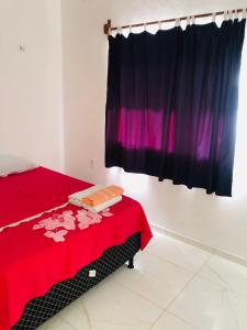 Ένα ή περισσότερα κρεβάτια σε δωμάτιο στο Casa do mar