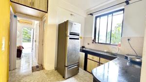 Cucina o angolo cottura di Muffys Pool Apartment