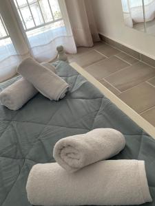 Postel nebo postele na pokoji v ubytování Spiti Nona