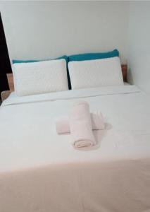 Postel nebo postele na pokoji v ubytování Affordable Condominuim