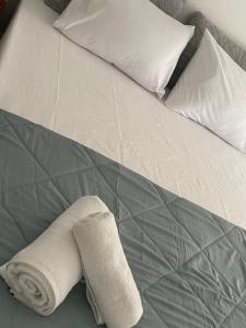 Postel nebo postele na pokoji v ubytování Spiti Nona