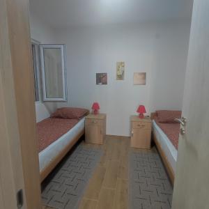 Krevet ili kreveti u jedinici u okviru objekta Apartman Krstić