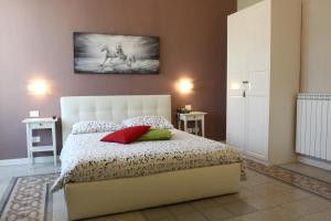 Letto o letti in una camera di B&B Suite Cutelli