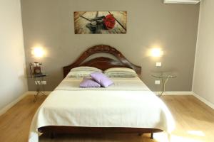 Letto o letti in una camera di B&B Suite Cutelli