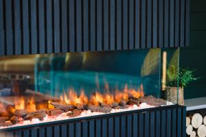 a grill with a bunch of food on it at Kite Lodge in Little Bytham
