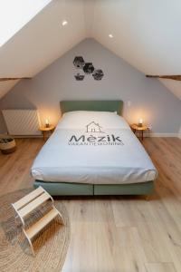 Postel nebo postele na pokoji v ubytování Vakantiewoning Mèzik