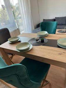 Uma área de estar em Apartman Fenix 2