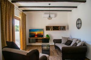 TV i/ili zabavni centar u objektu New Serenity Zen Garden Villa