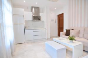 A kitchen or kitchenette at Macarena Home