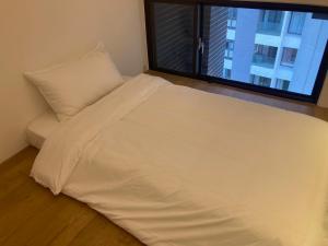 Giường trong phòng chung tại 礁溪楓禾Maple