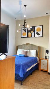 Ένα ή περισσότερα κρεβάτια σε δωμάτιο στο Deluxe Apto Guatemala zona 10 Edificio EON +22 φωτογραφίες