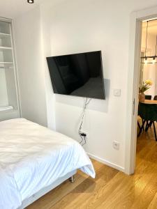Televiisor ja/või meelelahutuskeskus majutusasutuses Bulevard Luxury Suites