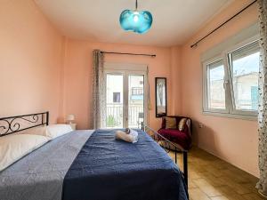 Postel nebo postele na pokoji v ubytování Jasmine Seaside House