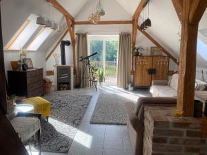 Posezení v ubytování Podkrovní studio apartment pro 1-5 osob