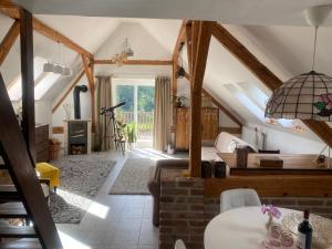 Posezení v ubytování Podkrovní studio apartment pro 1-5 osob