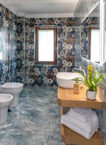 Koupelna v ubytování Maison Matie B&B Ercolano + 37 fotografií