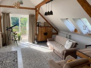 Posezení v ubytování Podkrovní studio apartment pro 1-5 osob