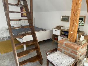 Kuchyň nebo kuchyňský kout v ubytování Podkrovní studio apartment pro 1-5 osob