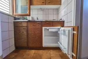Kuchyňa alebo kuchynka v ubytovaní Apartments MOST
