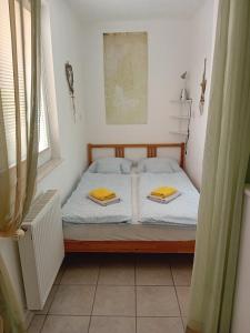 Postel nebo postele na pokoji v ubytování Apartma Peter1a