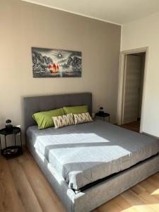 Postel nebo postele na pokoji v ubytování LaPignaVerde Suites