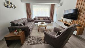 TV a/nebo společenská místnost v ubytování Value Living Apartment