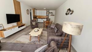 TV a/nebo společenská místnost v ubytování Value Living Apartment