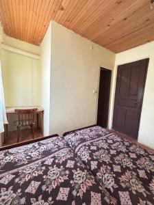 Postel nebo postele na pokoji v ubytování Guest house Bee