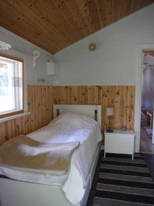 Кровать или кровати в номере Cozy Cabin at The Freedom Center