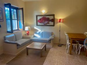 Posedenie v ubytovaní Costa Est Apartments + 37 fotografií