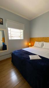 Postel nebo postele na pokoji v ubytování Lamparina Hostel