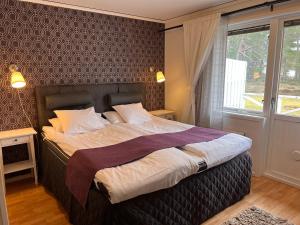 Voodi või voodid majutusasutuse Böda Hotell toas