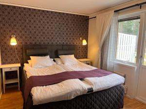 Voodi või voodid majutusasutuse Böda Hotell toas