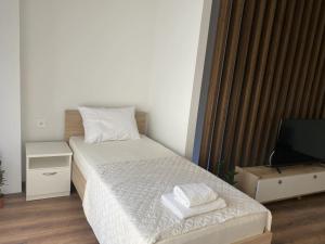 Postel nebo postele na pokoji v ubytování Valentina Apartament