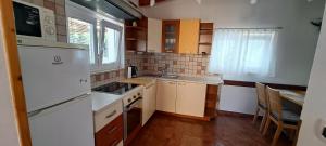 Kuchyň nebo kuchyňský kout v ubytování San Lorenzo Apartments
