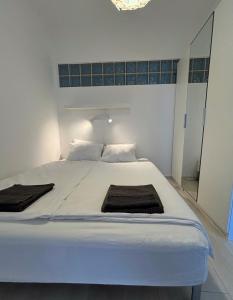 Posteľ alebo postele v izbe v ubytovaní Club218 The Sunset - wellness apartment