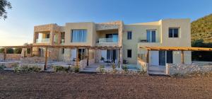 a villa with a view of a house at IVANKA'S VILLAS in Skala Rachoniou